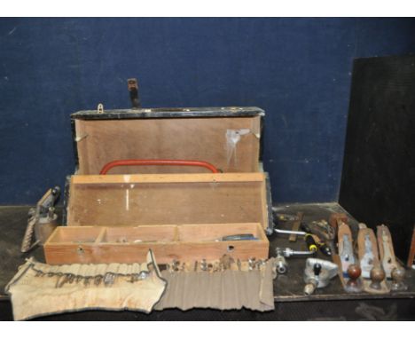 A VINTAGE CARPENTERS TOOLCHEST with drop down half front concealing one internal drawer and containing tools such as a Record
