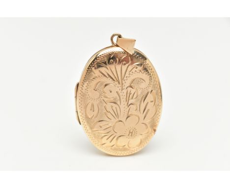 A 9CT GOLD OVAL LOCKET, floral pattern, hallmarked 9ct Birmingham, fitted with a tapered bail, length including bail 43mm, ap