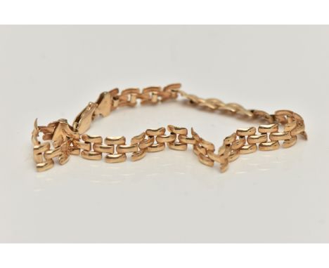 A 9CT GOLD ARTICULATED BRACELET, fitted with a lobster clasp, hallmarked 9ct Birmingham, length 175mm, approximate gross weig
