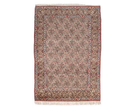 Orientteppich "Mir-e-butha". PERSIEN, 20. Jh., ca. 202x138 cm Der hellbeigefarbene Mittelfeldteppich zeigt eine all over Bote