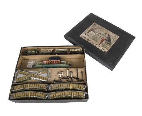 Bing Table Top 00 Gauge GWR Clockwork Train Set, comprising 2-4-0 Tank Engine, three Coaches, Station, three Signals, two Tel