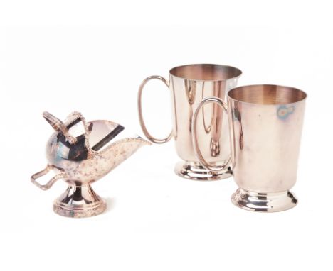 A GROUP OF MAPPIN &amp; WEBB SILVER PLATED ITEMS
Comprising: a pair of mugs, in a fitted box; and a sugar scuttle and scoop, 