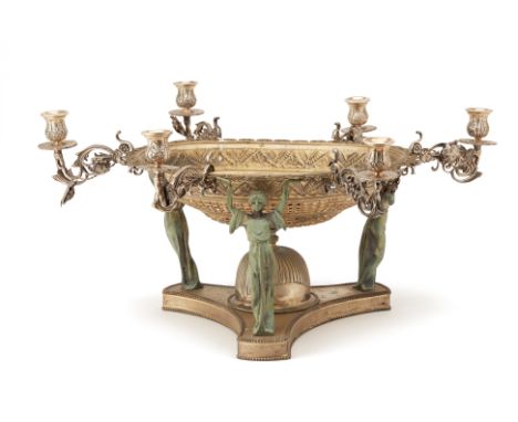 A LARGE SIX LIGHT SILVER PLATED CANDELABRUM CENTREPIECE
With three female figure shaped supports, and six foliate candlestick