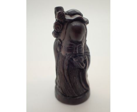 Signed wooden netsuke of a wise man 