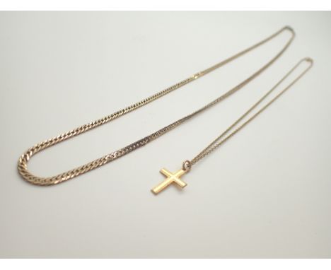 Yellow metal chain and a rolled gold crucifix 