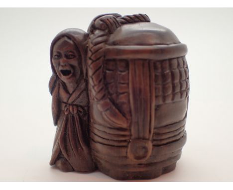 Signed wooden netsuke of a old woman 