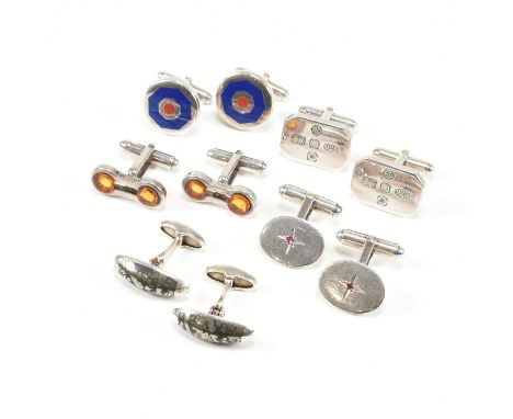 An assorted collection of silver cufflinks. The lot to include a pair of bullet back style ingot cuff links with irregular oc