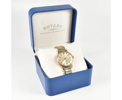 A hallmarked 9ct yellow gold Rotary wristwatch. The watch having a circular silvered dial with date aperture to six, gold ton
