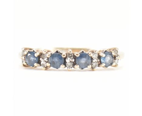A hallmarked 9ct gold sapphire and diamond ring. The ring being set with four round cut sapphires and ten round cut diamonds.