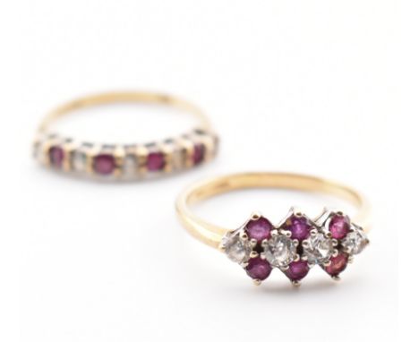 Two hallmarked 9ct yellow gold, ruby &amp; white stone rings. The first ring having four round cut prong basket set rubies al