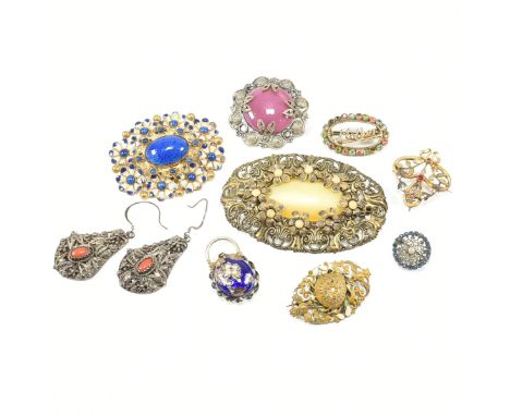 An assorted collection of Czechoslovakian style jewellery. The lot to include Czech style bohemian design brooches & earrings
