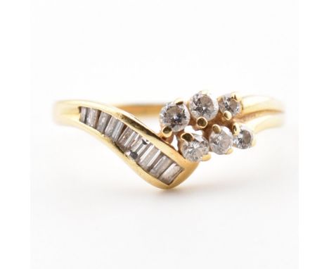 A vintage 18ct yellow gold &amp; diamond crossover ring. The ring of wrap around form having a cluster of six graduating roun