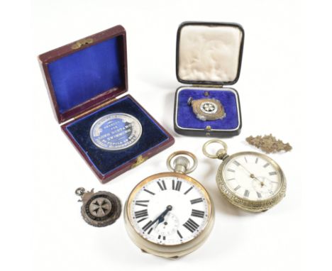 An assorted collection of silver &amp; white metal. The lot to include a black enamel Maltese cross St. John ambulance associ