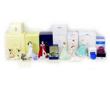 A collection of figurines and paperweights, including a Royal Worcester celebratory 80th Birthday 2006 Queen ERII in her robe