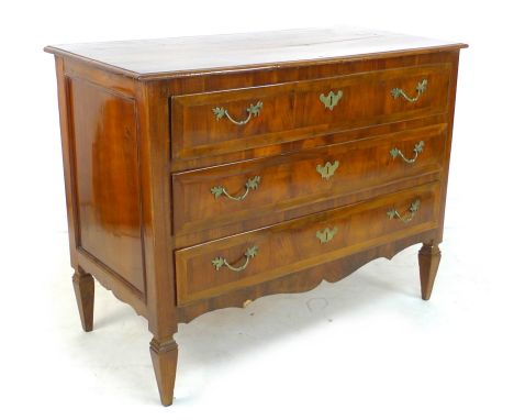 An Italian fruitwood commode, late 18th century, the rectangular top with moulded edges, above three drawers with brass folia