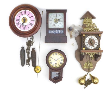 A group of four clocks, including a miniature drop dial wall clock, a small mantle clock, a pink dial weighted clock, with an