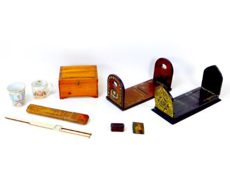 A group of collectables, including a Queen Victoria 1897 Jubilee enamel mug, 8.5 by 9.5cm high, two book slides, a wooden tri
