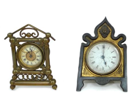 Two brass mounted mantel clocks, a British United clock 11.5 by 5.5 by 20cm high, and an American clock with Roman numerals, 