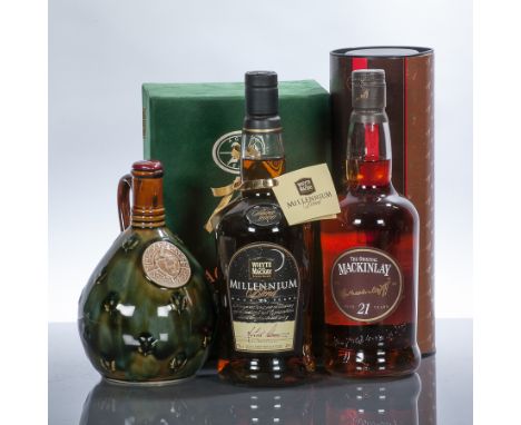 MACKINLAYS SPECIAL REPLICA DECANTER 
Blended Scotch Whisky, aged 20 years. In Wade flagon, in presentation box.
WHYTE & MACKA