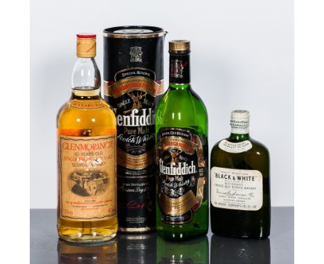 BLACK & WHITE
Blended Scotch Whisky by James Buchanan, with clasp seal. 13 1/3 fl oz, 70° Proof.
GLENMORANGIE 10 YEAR OLD
Sin