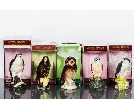 WHYITE & MACKAY CERAMIC BIRD SELECTION
WHYTE & MACKAY SHORTED EARED OWL
Blended Scotch Whisky in Royal Doulton ceramic. 20cl,