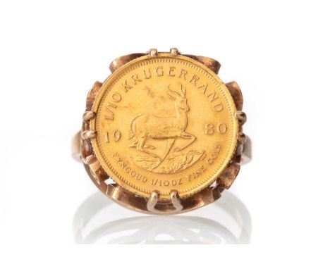 GOLD 1/10oz KRUGERRAND RING 1980, to a nine carat gold mountQty: 7gSize P