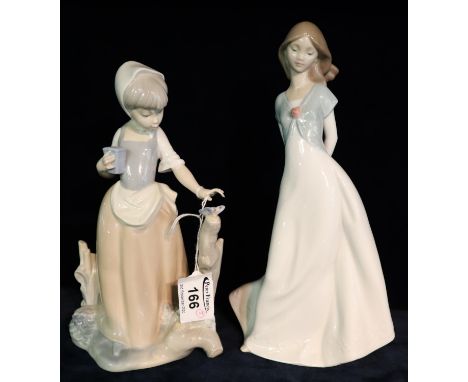 Two Nao Spanish porcelain figurines of young girls, one with butterfly. (2)(B.P. 21% + VAT) No obvious damage.