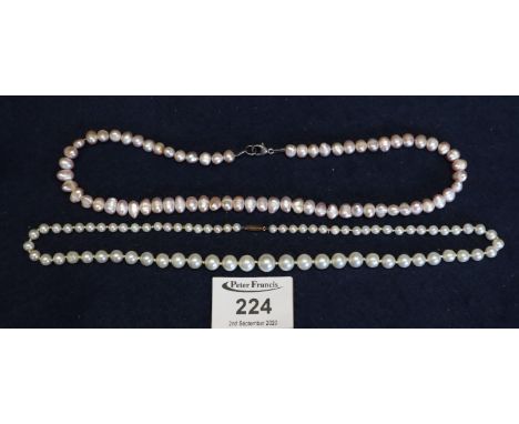 Two natural pearl necklaces, one probably freshwater, one cultured. (2) (B.P. 21% + VAT)Two largest pearls are 8 & 6mm approx