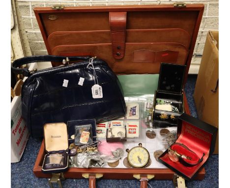 A vintage faux crocodile skin handbag containing various costume jewellery items, a Ronson lighter in case, a small oriental 