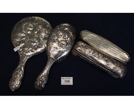 Group of mixed silver backed dressing table items to include; matching cherub design hand mirror and two brushes, together wi