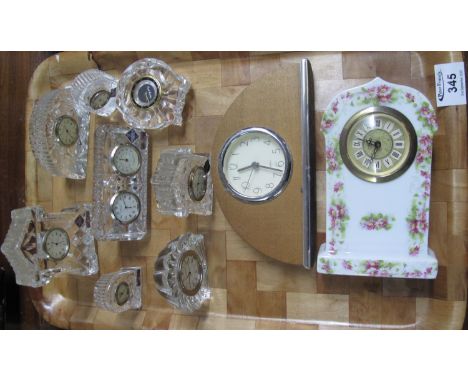 Tray of mainly Edinburgh crystal mantel clocks of varying forms, together with a Waterford crystal mantel clock, ceramic flor