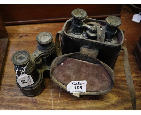 Two pairs of vintage binoculars, First World War period and another. (2)(B.P. 21% + VAT) Very dirty and poor condition.