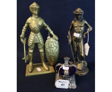 Diecast metal crown with opening mechanism, a cast brass fireside figure of a knight with shield and axe and a cast yellow me