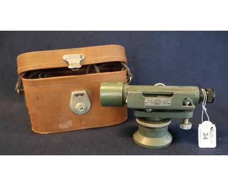 A Hilger & Watts English made surveyors level or theodolite in original simulated leather case. 18cm long approx. (B.P. 21% +