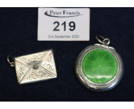Silver enamel decorated cushion shaped miniature compact with suspension loop, together with a silver envelope shaped match c