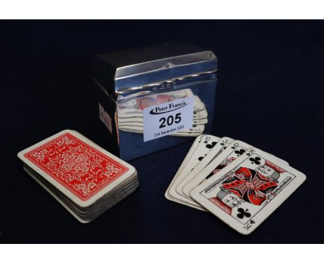 Silver rectangular shaped playing card box with hinged cover having card cut leading edge and containing two sets of small pl
