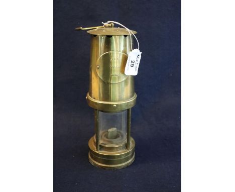 Clark Taylor Group brass miner's safety lamp, appearing unused. 24cm high approx. (B.P. 21% + VAT) Tarnished but no obvious d