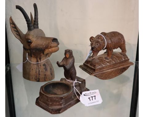 A Black forest carved wooden chamois in the form of an inkwell, together with an ink blotter in the form of a striding Black 