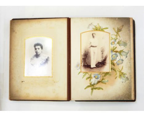 Victorian embossed leather photograph album and contents of portrait photographs of both children and adults 