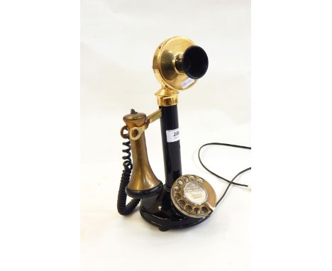 Candlestick telephone with brass mouthpiece 
