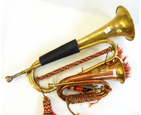 Regimental copper and brass bugle for the Royal Welsh Fusiliers and a French brass cavalry trumpet by Couesnon, 105 Rue la Fa
