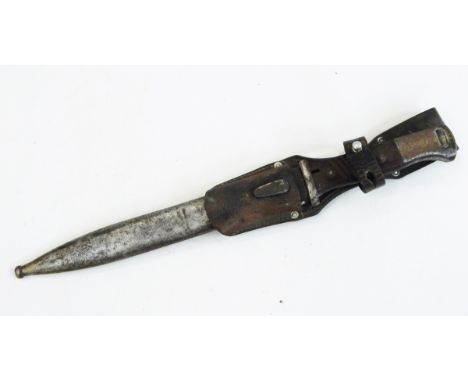 German WWII K98 bayonet by Gebr. Heller, the steel blade numbered 1224, with wooden hilt, in metal scabbard and leather holde