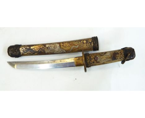 Japanese short sword, the metal hilt and scabbard decorated with tigers, the brass tsuba with figural decoration 