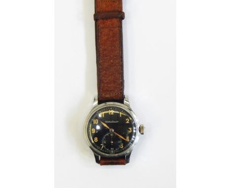 Jaeger-Lecoultre gent's wristwatch the black face with luminous hands and numerals, subsidiary seconds dial, the back numbere