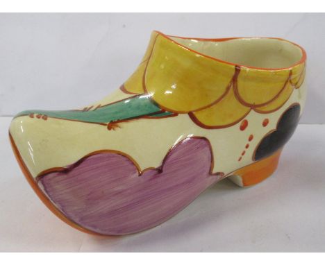 A Clarice Cliff clog, decorated in the Summerhouse pattern, height 3.5ins Condition Report:   The clog is in good condition, 