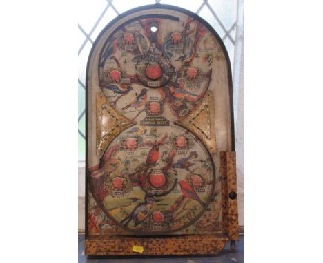 A Lindstrom's Nesting Birds metal bagatelle board