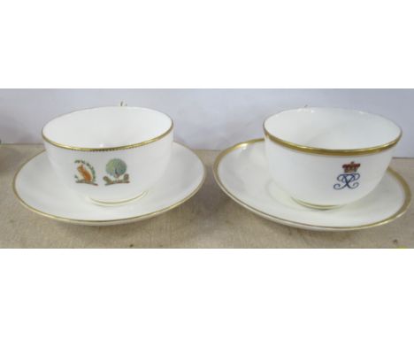 Two Royal Worcester cups and saucers, with crests