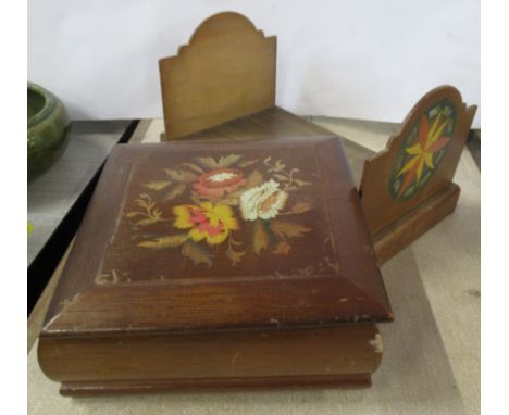 A wooden book trough, together with a musical jewellery box