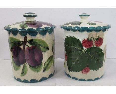 Two Wemyss pottery preserve jars, with covers, one decorated with raspberries, the other damson plums, height 5.5ins