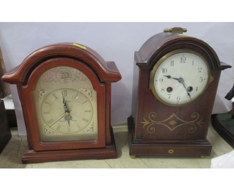 An Edwardian mantel clock, with brass inlay, together with a modern mantel clock